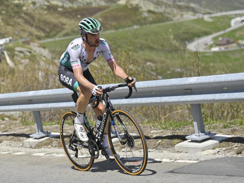            Radprofi Maximilian Schachmann vom Team Bora-hansgrohe während eines Anstiegs bei der Tour de Suisse. Foto: Gian Ehrenzeller/KEYSTONE/dpa         